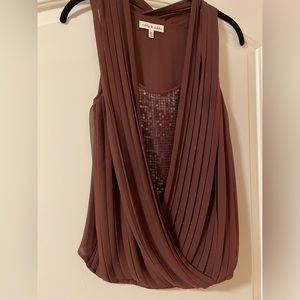 Blouse with sequin layer